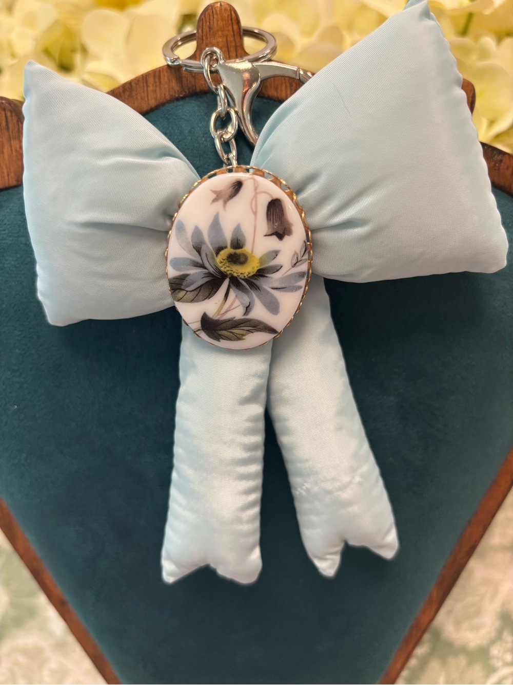 Light Blue Satin Bow Keychain with Floral Cameo